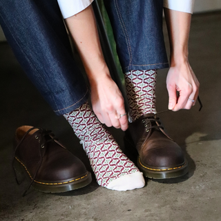 girl wearing tile print cotton socks 