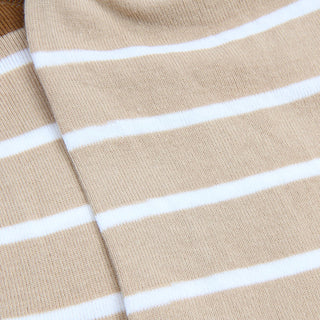Close-up of beige fabric with white stripes