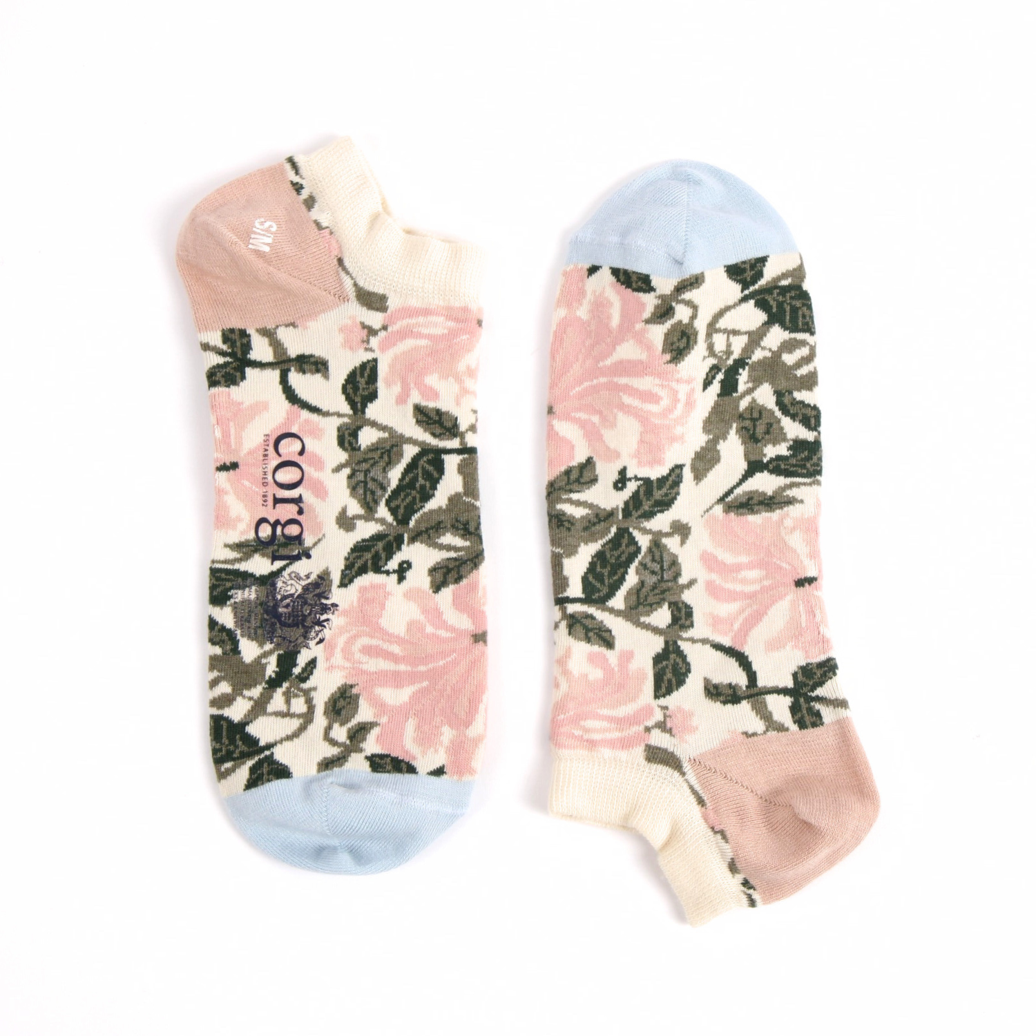 Floral patterned socks with 'corgi' branding on a white background