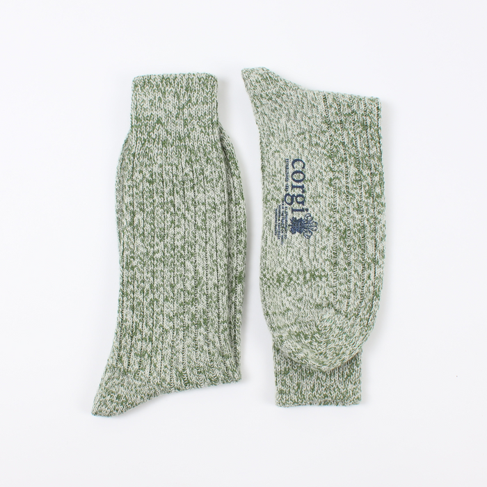 green marl socks laid flat side by side.