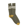 Pair of green socks with top white sporty stripes and yellow accents on the heel and toe photographed on a white background