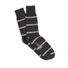 A pair of grey striped socks with a ribbed cuff, and yellow toe line designed for men.