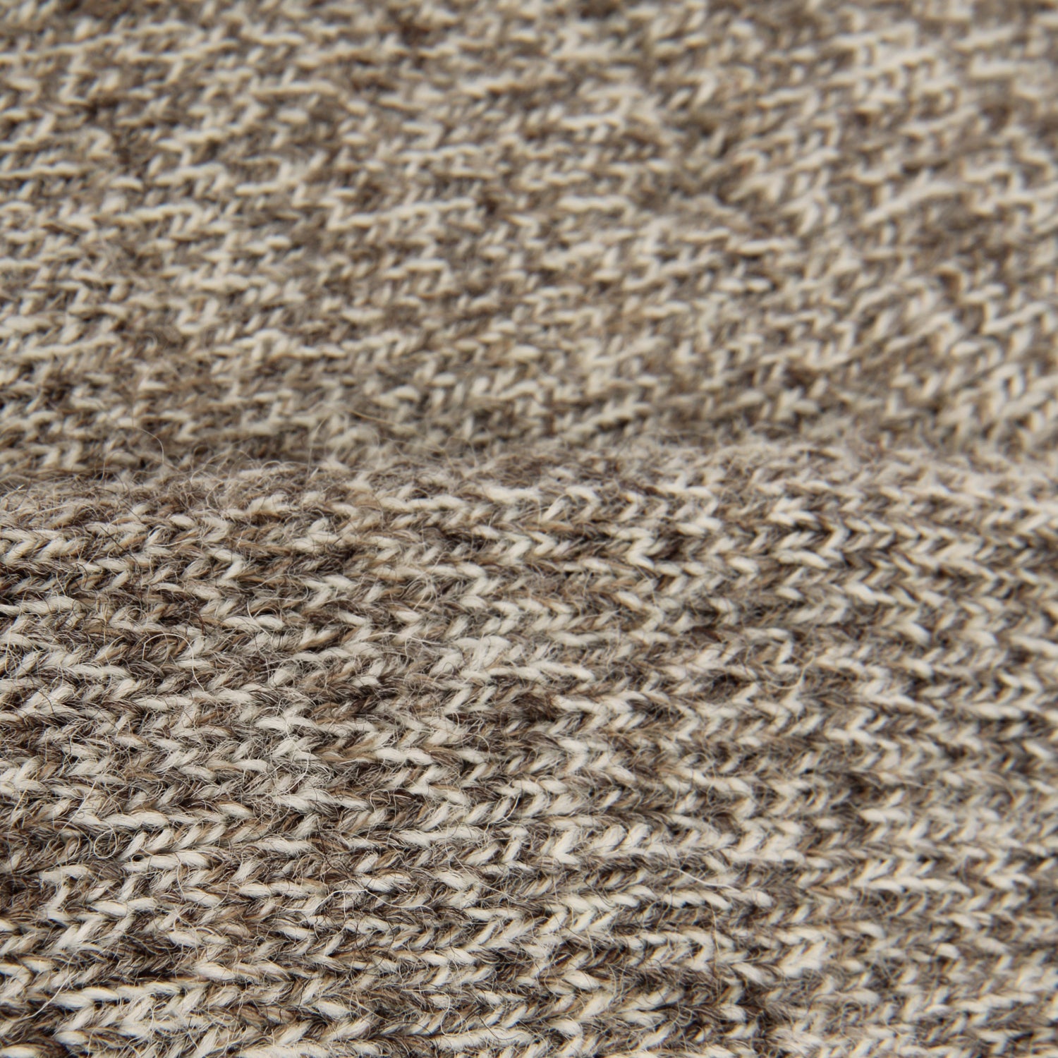 Close-up of a textured brown and beige socks
