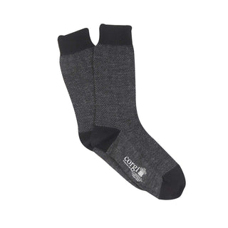 Gray sock with black accents on a white background