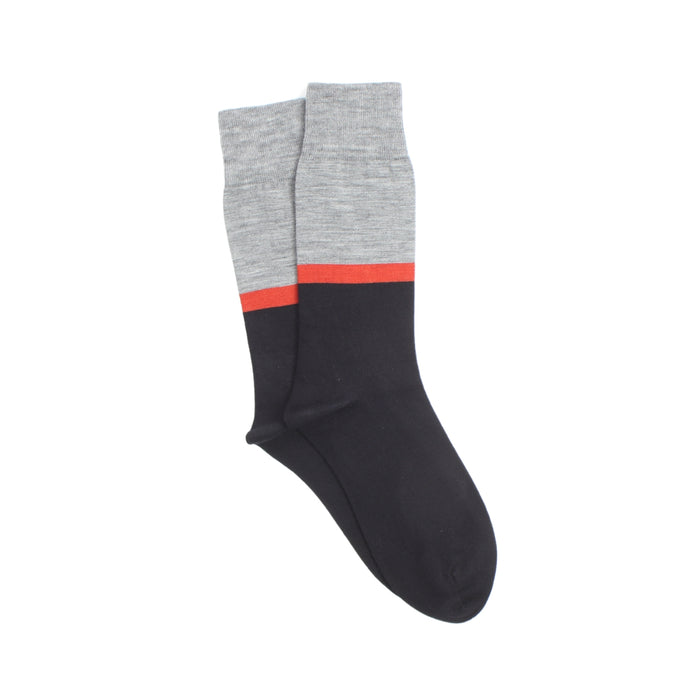 Black sock with gray top and orange band on a white background