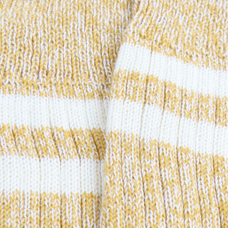 Close-up of yellow and white striped fabric texture