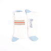 Pair of socks with striped pattern and 'corgi' branding on a white background