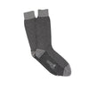A pair of men's formal socks with a geometric pattern in silver and charcoal colors on a white background