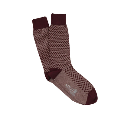 A pair of men's formal socks with a geometric pattern in wine and port colours on a white background.