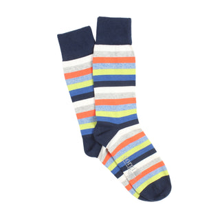 Colourful striped socks with navy cuffs photographed on a white background