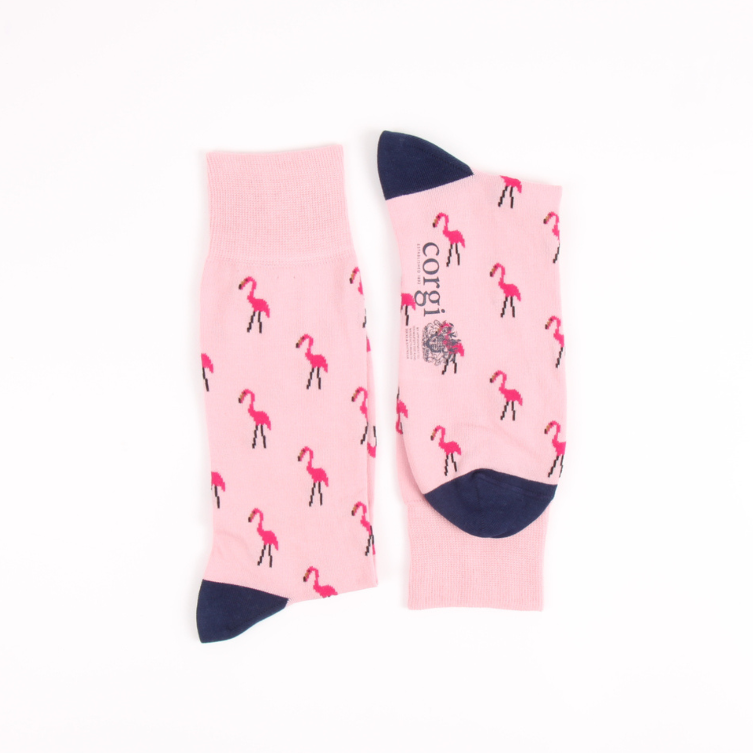 Pink socks with flamingo pattern and navy toes on a white background