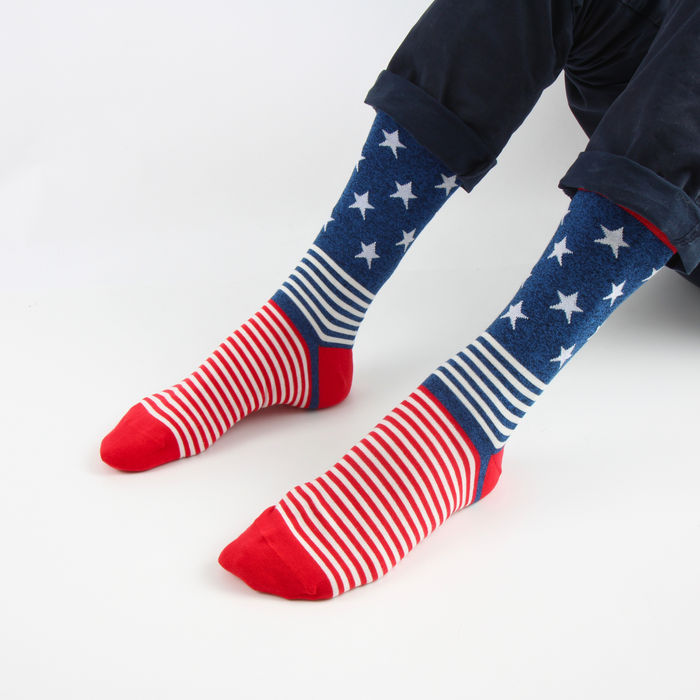 person wearing USA flag socks with stars and stripes pattern
