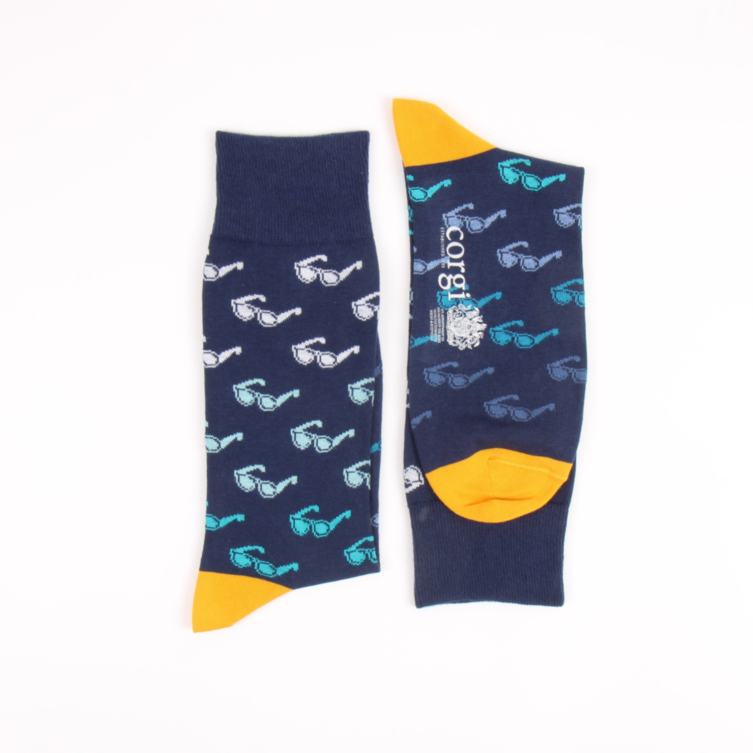 Navy socks with sunglasses pattern and yellow accents on a white background