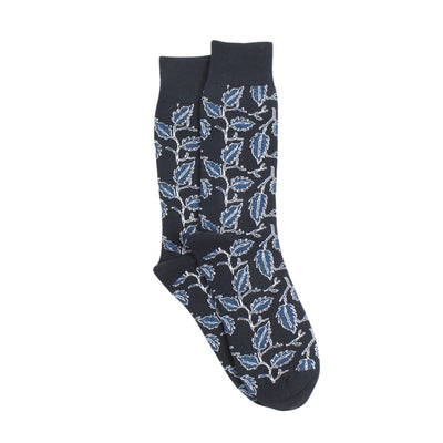 Navy sock with blue leaf pattern on a white background