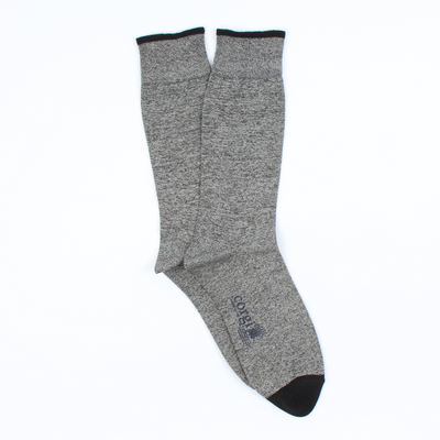 A pair of men's marl cotton socks in a mid-calf length with a ribbed cuff, featuring a subtle pattern and the brand 'Corgi' visible on the foot area.