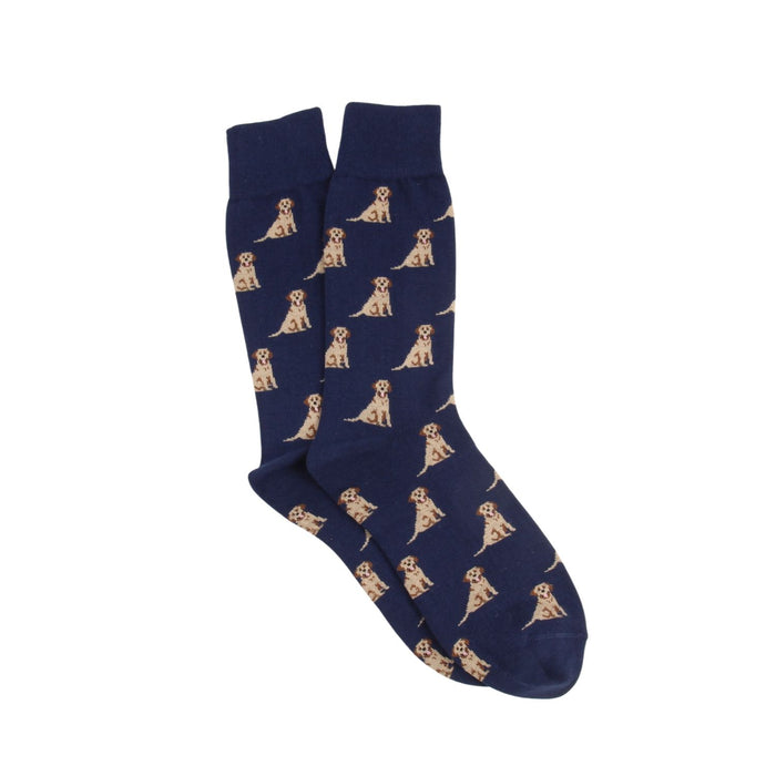 Navy blue socks with an all over  golden brown Labrador dog pattern photographed on a white background