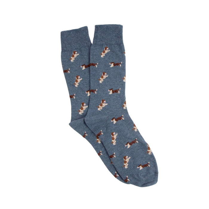 Pair of blue socks with dog pattern on a white background