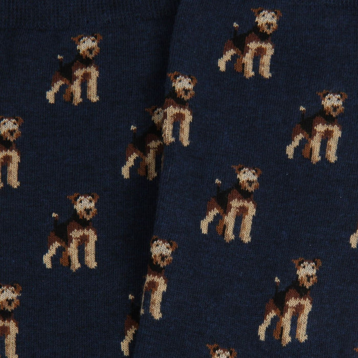 Pattern of dogs on a dark blue fabric background