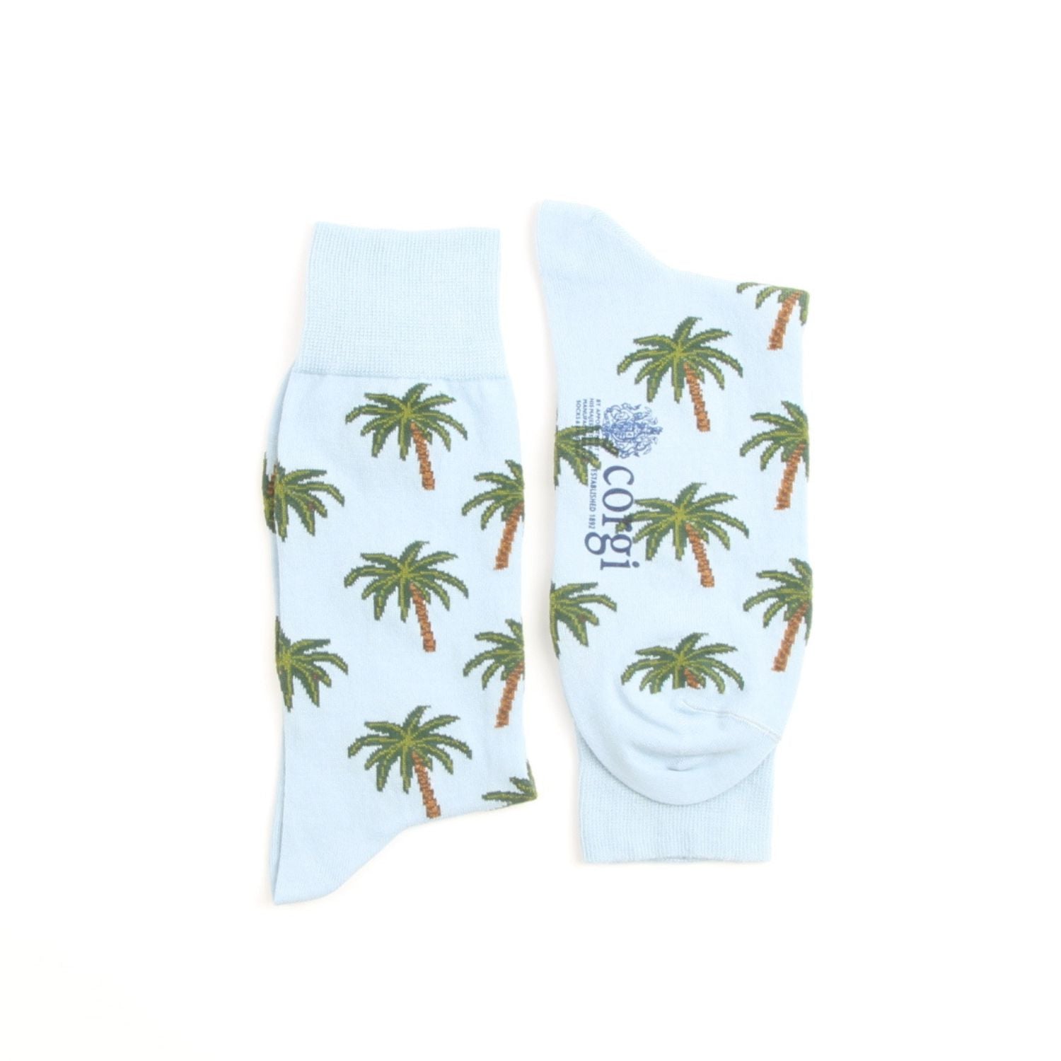 Light blue socks with palm tree pattern on a white background