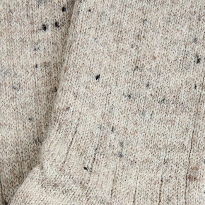 close up detail of the flecked yarn on the British Wool.