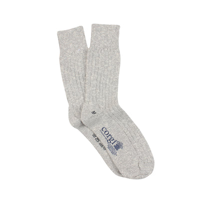 A pair of plain grey and white  cotton socks .
