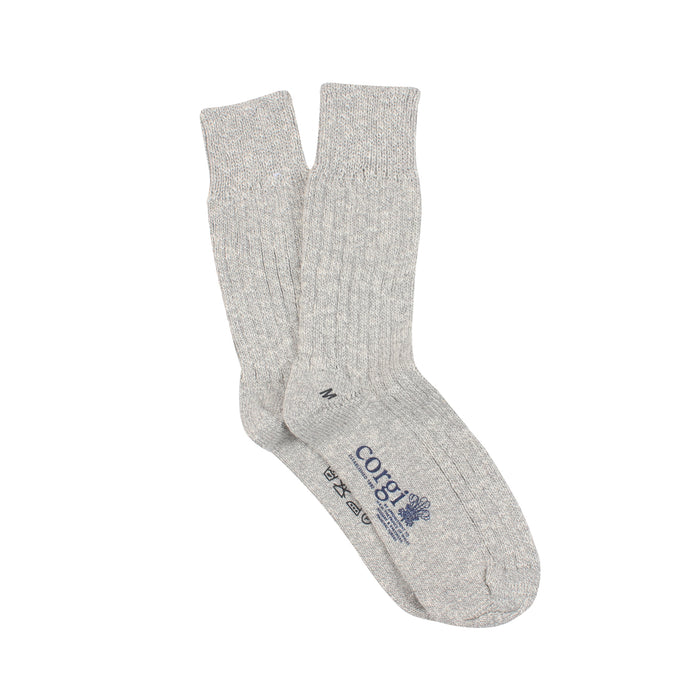 A pair of plain grey and white  cotton socks .