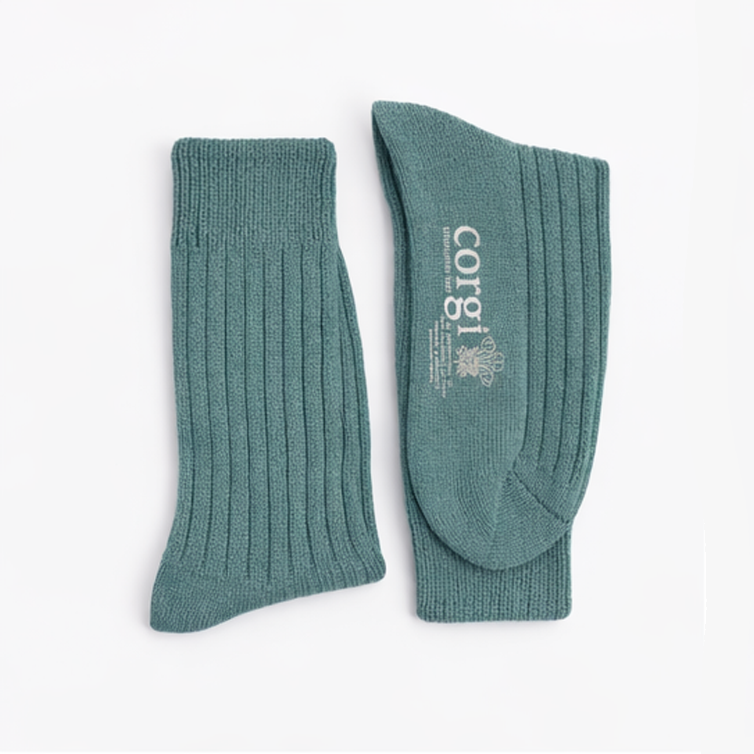 Pair of teal socks with a visible brand logo on a white background