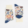 Pair of floral-patterned socks with blue accents on a white background