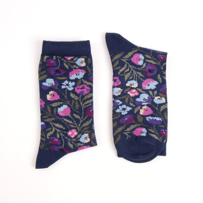 Pair of floral-patterned socks on a white background