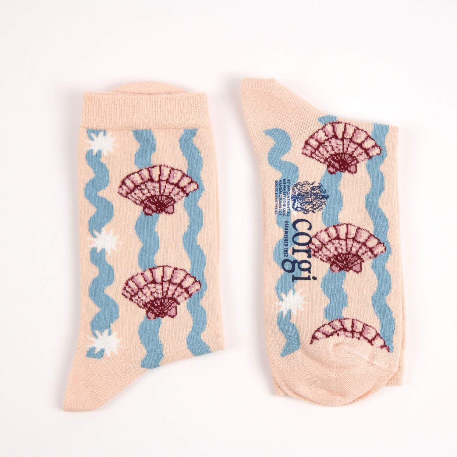 Pair of socks with shell design on a white background