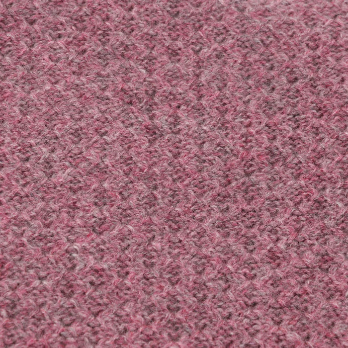 close up of textured poncho  in pink