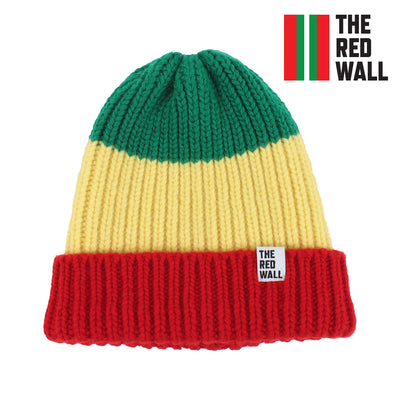 A striped wool beanie hat in green, yellow, and red colors, with 'THE RED WALL' text on the side.