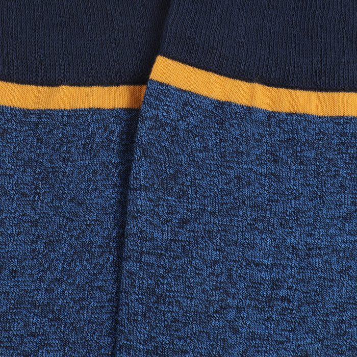Close-up of blue socks with a yellow trim