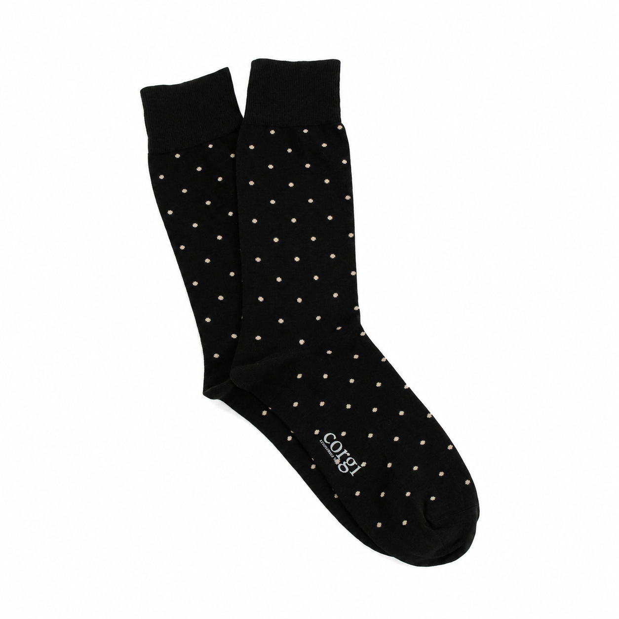 Black socks with white polka dots on a white background