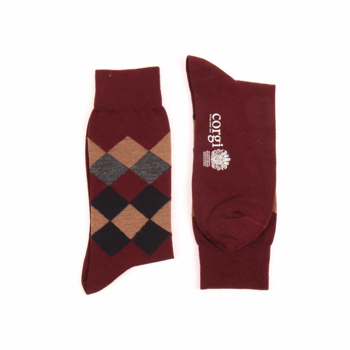 A pair of burgundy crew socks shown flat on a white background, with one sock displaying a diamond argyle pattern in brown, gray, and black, and the other showing a white 'corjl' logo.