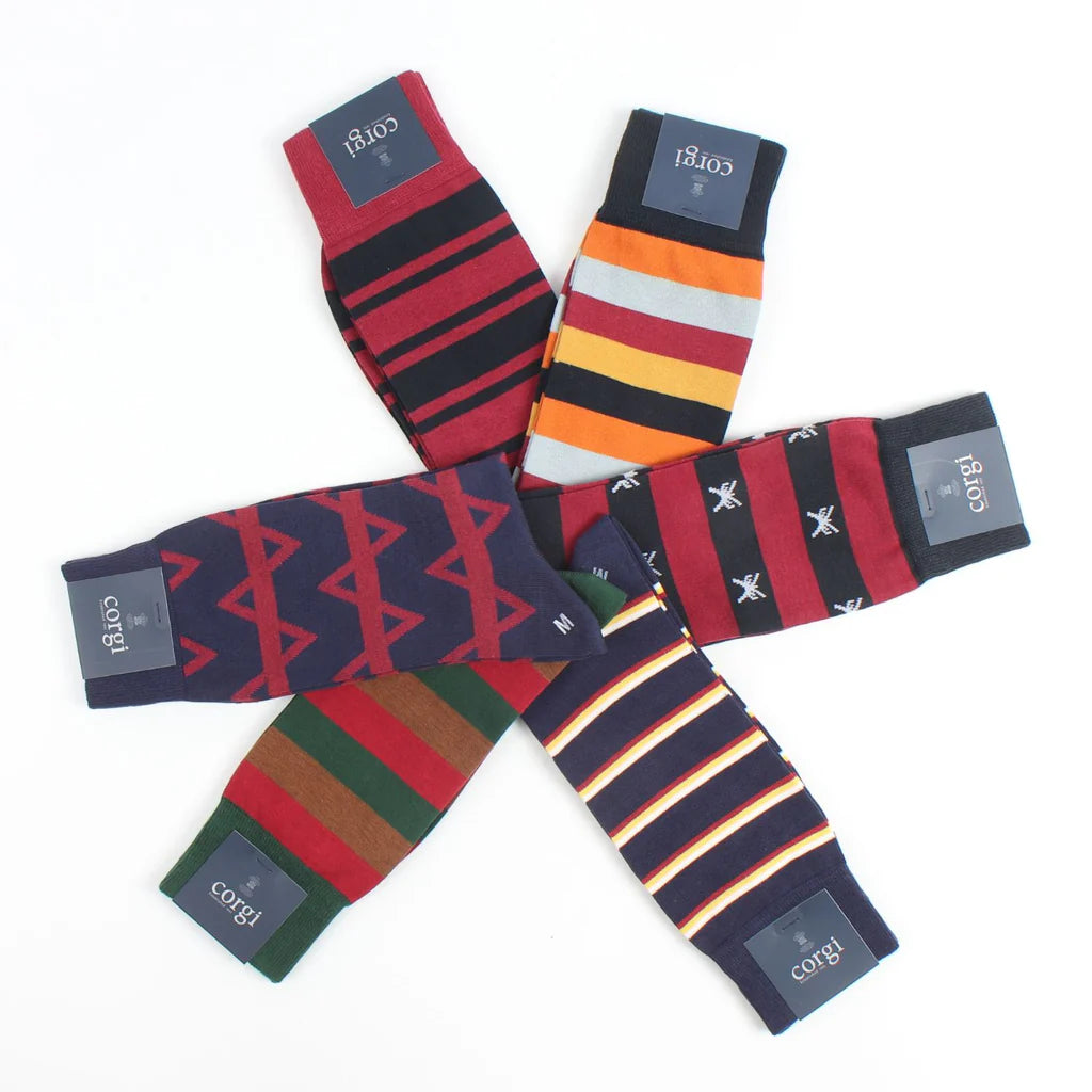 Collection of colorful socks with patterned designs on a white background