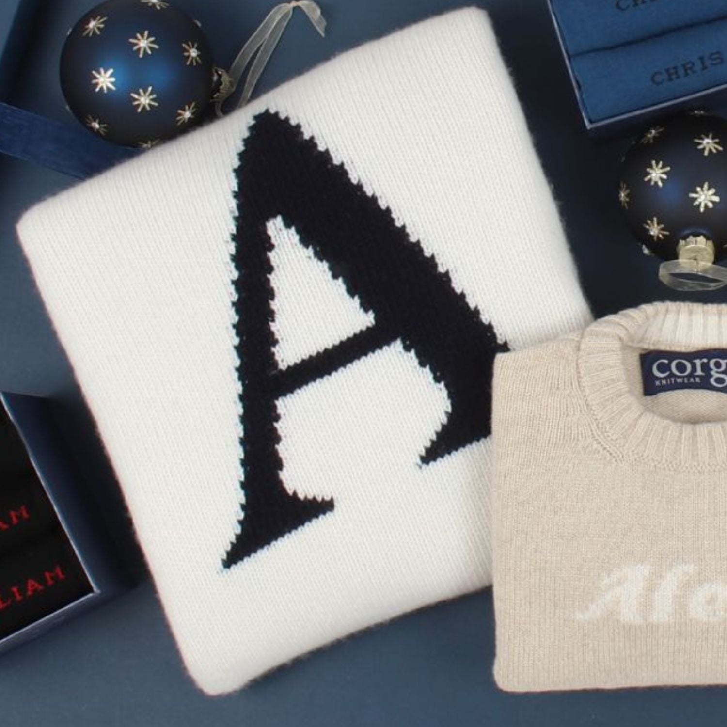 sweater on a Christmas gifting flat lay display