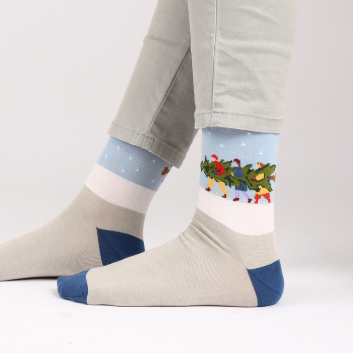Men's Cotton Socks with an image of three men carrying a large Christmas tree in the snow