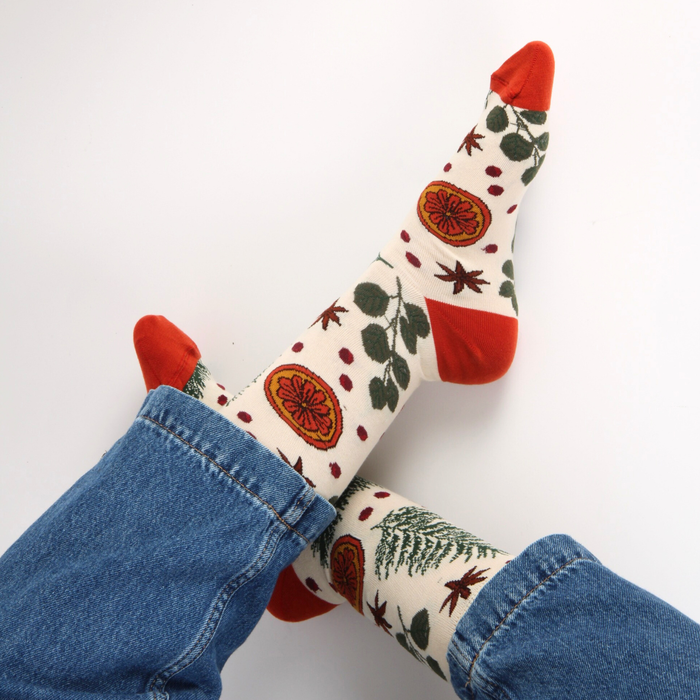 Decorative socks with floral pattern on a white background