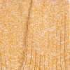 Close-up of yellow textured fabric