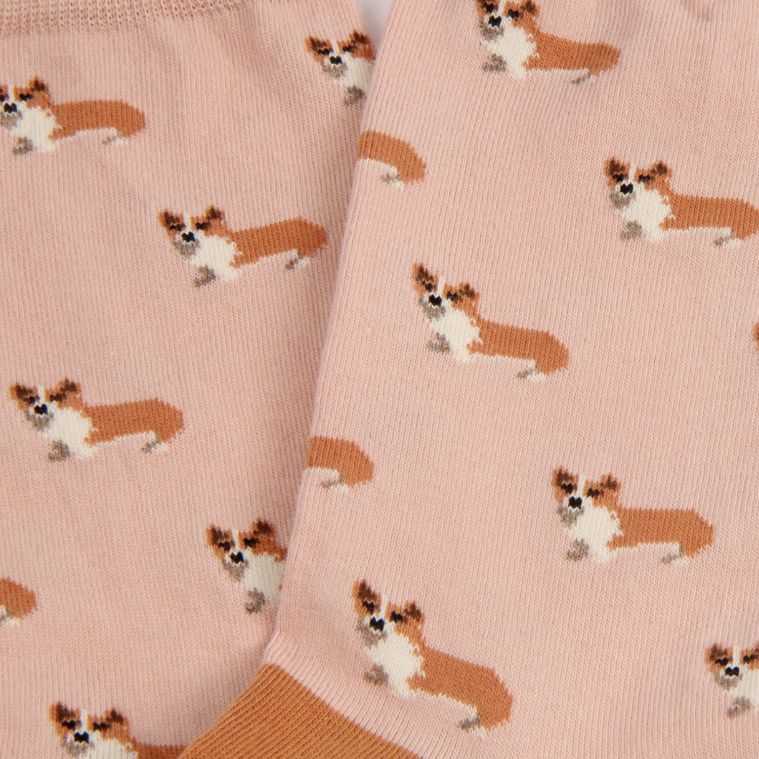 Pink fabric with corgi dog pattern
