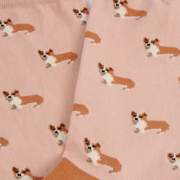 Pink fabric with corgi dog pattern