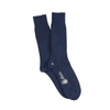 Pair of navy blue socks with a logo on a white background
