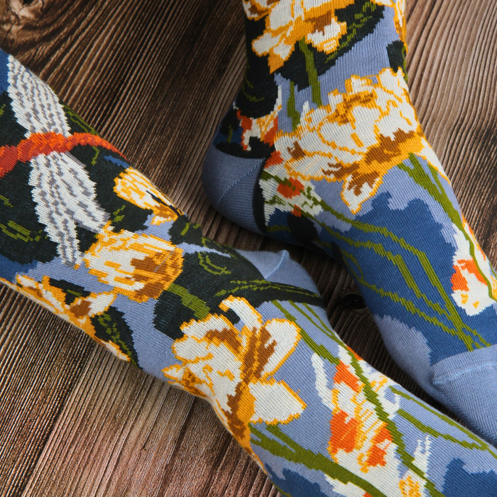 Floral patterned socks on a wooden surface
