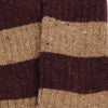 Close-up of a striped fabric with brown and beige colors.