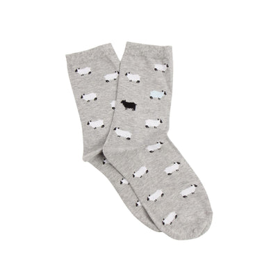 Gray socks with black and white sheep pattern on a white background