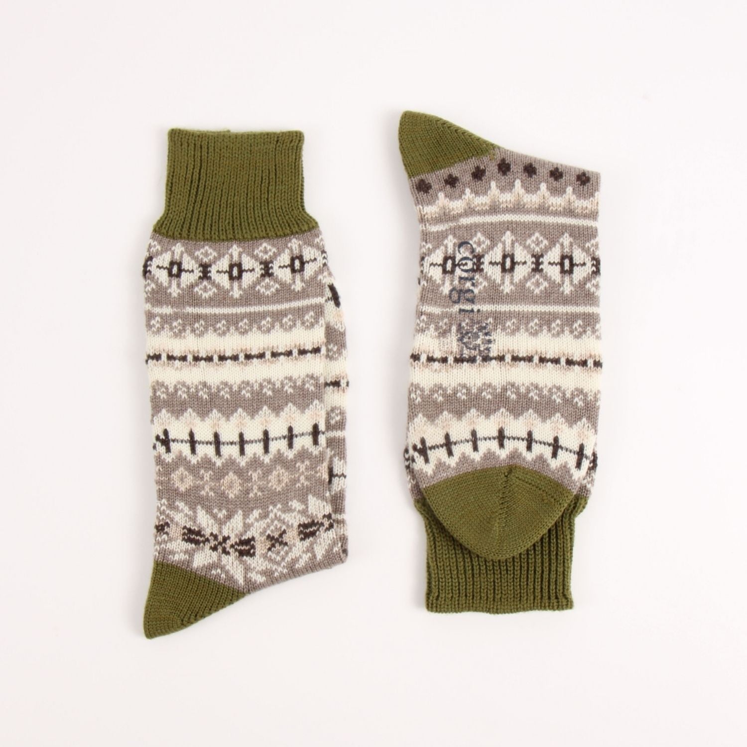 A pair of crew socks with a Fair Isle pattern in olive green, beige, and gray, displayed flat on a white background.