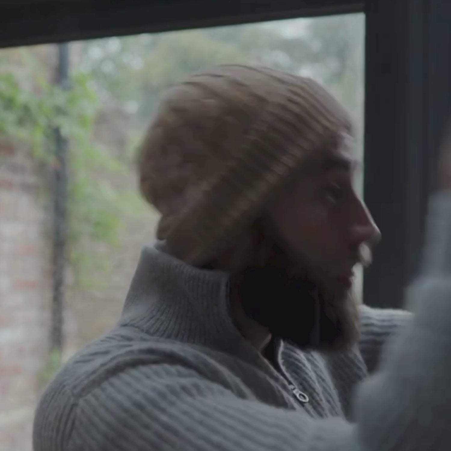 video of person wearing the colour split scarf