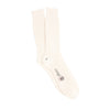 Beige sock with 'Corgi' branding on a white background