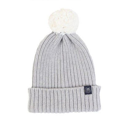 A women's two-tone wool beanie in grey with a plush pom pom on top.
